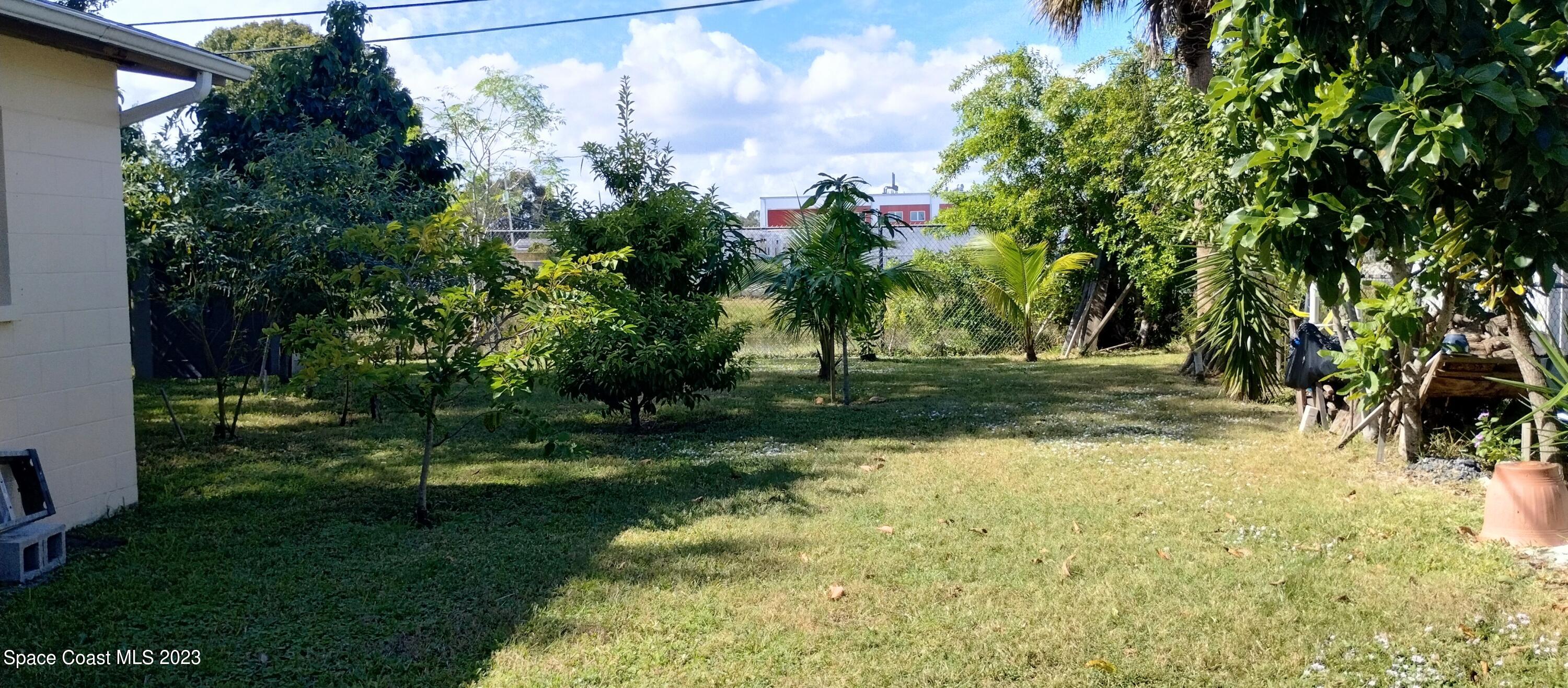 4100 Edwards Street Melbourne, FL 32901 - Photo 20 of 22 a view of backyard with green space