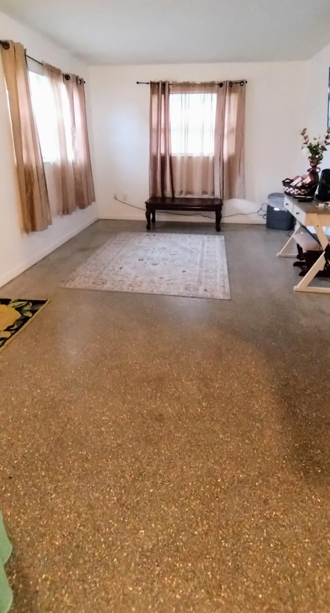 4100 Edwards Street Melbourne, FL 32901 - Photo 3 of 22 an empty room with windows