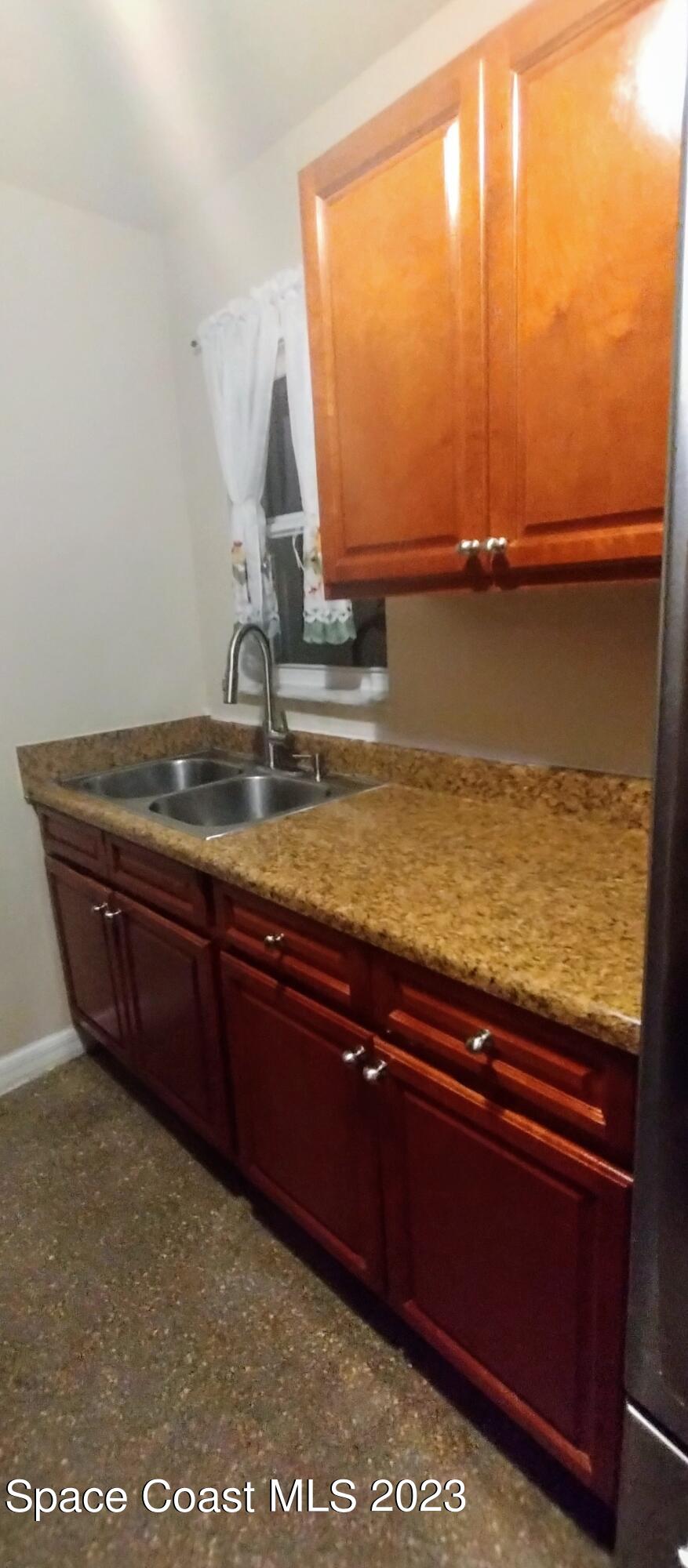 4100 Edwards Street Melbourne, FL 32901 - Photo 9 of 22 a view of a sink with an ocean view