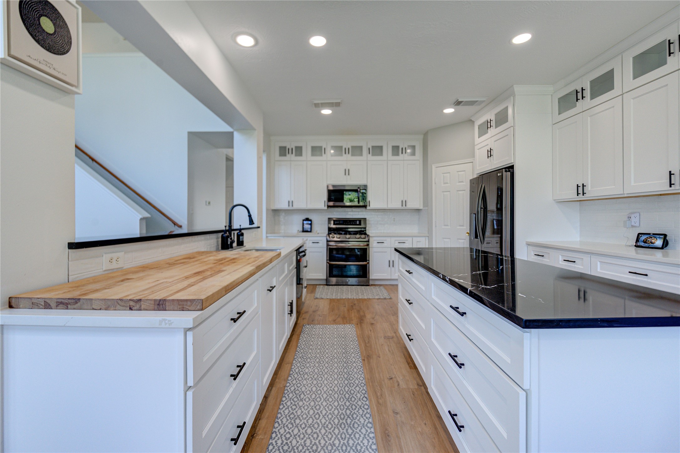 10906 Trail Ridge Drive Houston, TX 77064 - Photo 14 of 41 Equipped with quality appliances, including a refrigerator, for a move-in-ready experience.