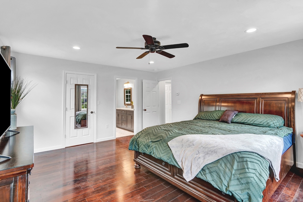 170 Shea Road West Brookfield, MA 01585 - Photo 19 of 30 a bedroom with a bed and a flat screen tv