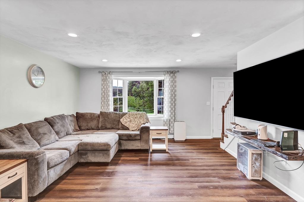 170 Shea Road West Brookfield, MA 01585 - Photo 2 of 30 a living room with furniture and a flat screen tv