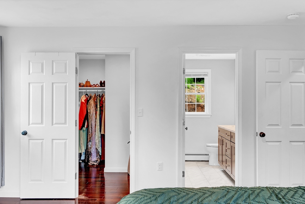 170 Shea Road West Brookfield, MA 01585 - Photo 27 of 30 a view of walk in closet with clothes and shoes