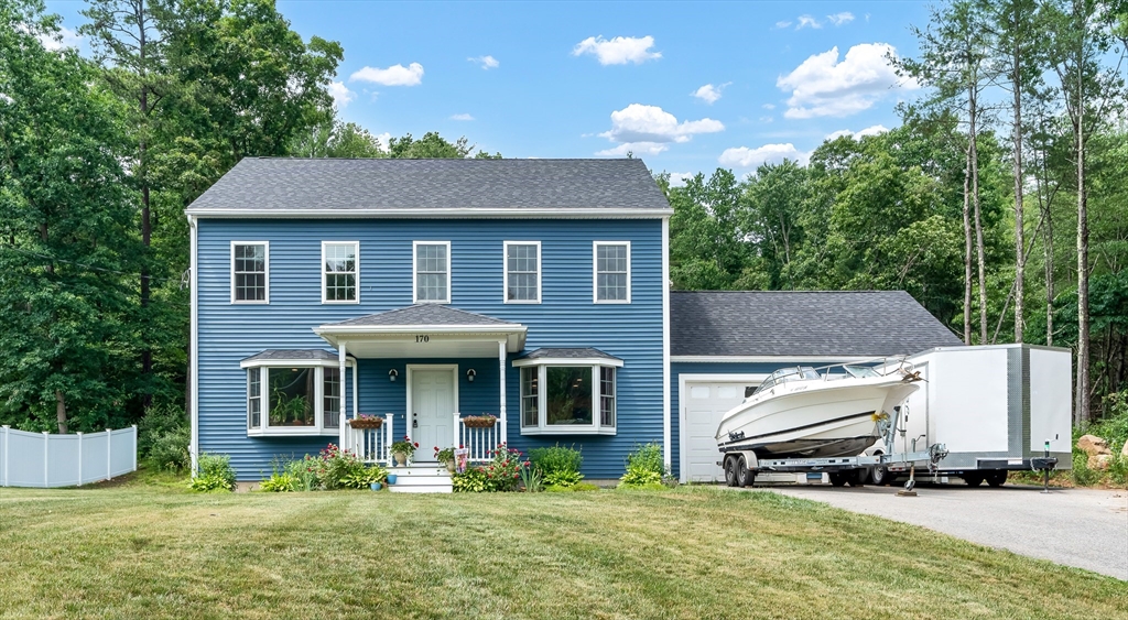 170 Shea Road West Brookfield, MA 01585 - Photo 4 of 30 a front view of a house with a yard