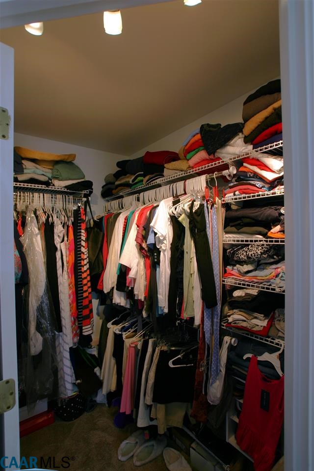 803 Harris Road Charlottesville, VA 22902 - Photo 12 of 15 a view of walk in closet with clothes and shoes
