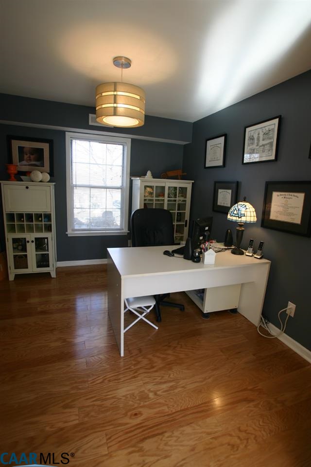803 Harris Road Charlottesville, VA 22902 - Photo 4 of 15 a view of a workspace with wooden floor