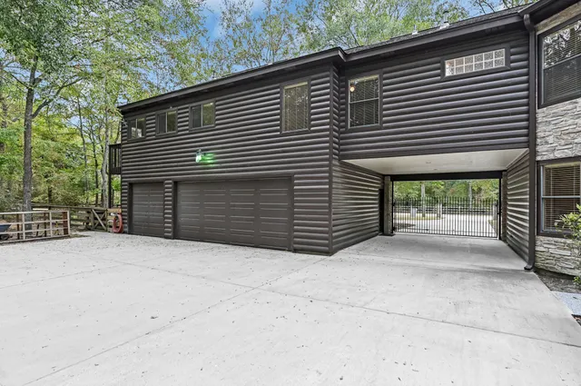 a front view of a house with a garage