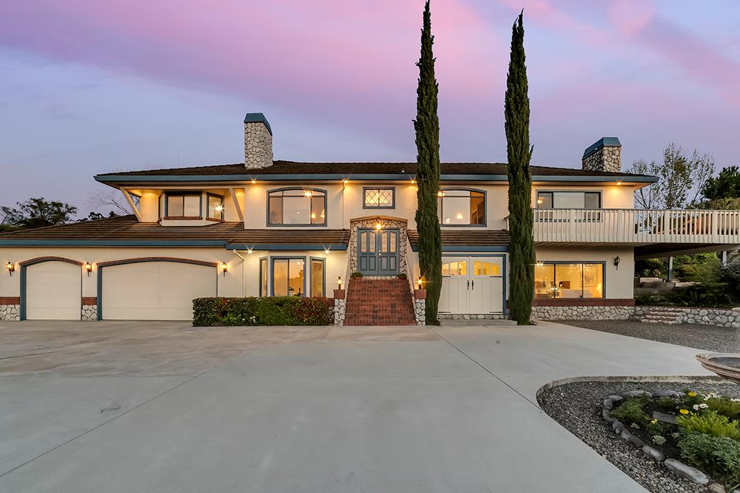 3130 Springview Lane San Jose, CA 95140 - Photo 1 of 47 a front view of a house with a yard