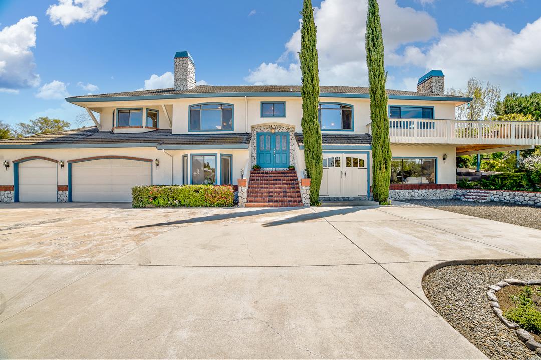 3130 Springview Lane San Jose, CA 95140 - Photo 2 of 47 a front view of a multi story residential apartment building