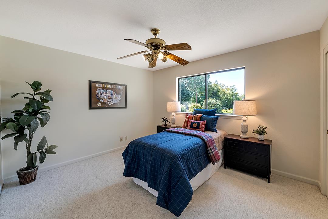 3130 Springview Lane San Jose, CA 95140 - Photo 14 of 47 a bed room with a bed and a potted plant
