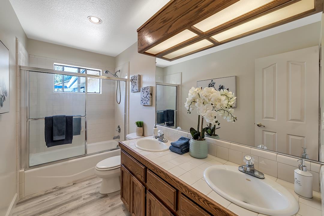 3130 Springview Lane San Jose, CA 95140 - Photo 16 of 47 a bathroom with a sink a toilet and shower