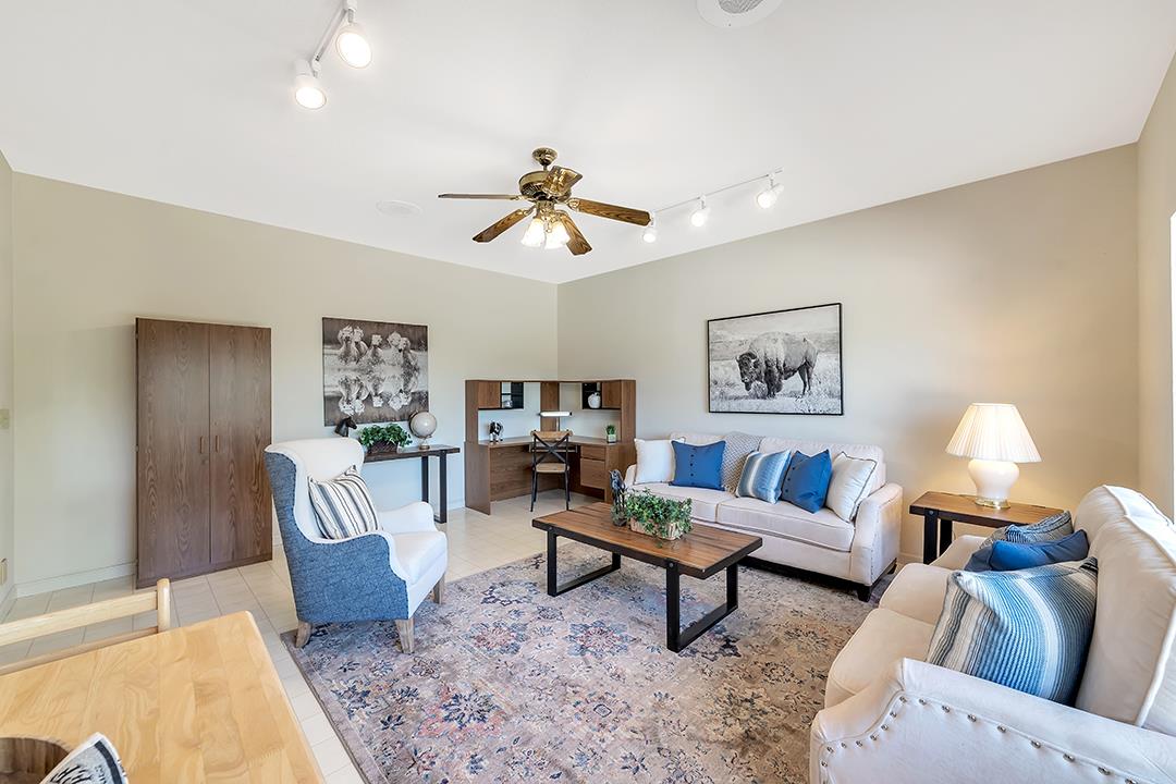 3130 Springview Lane San Jose, CA 95140 - Photo 20 of 47 a living room with furniture and a rug