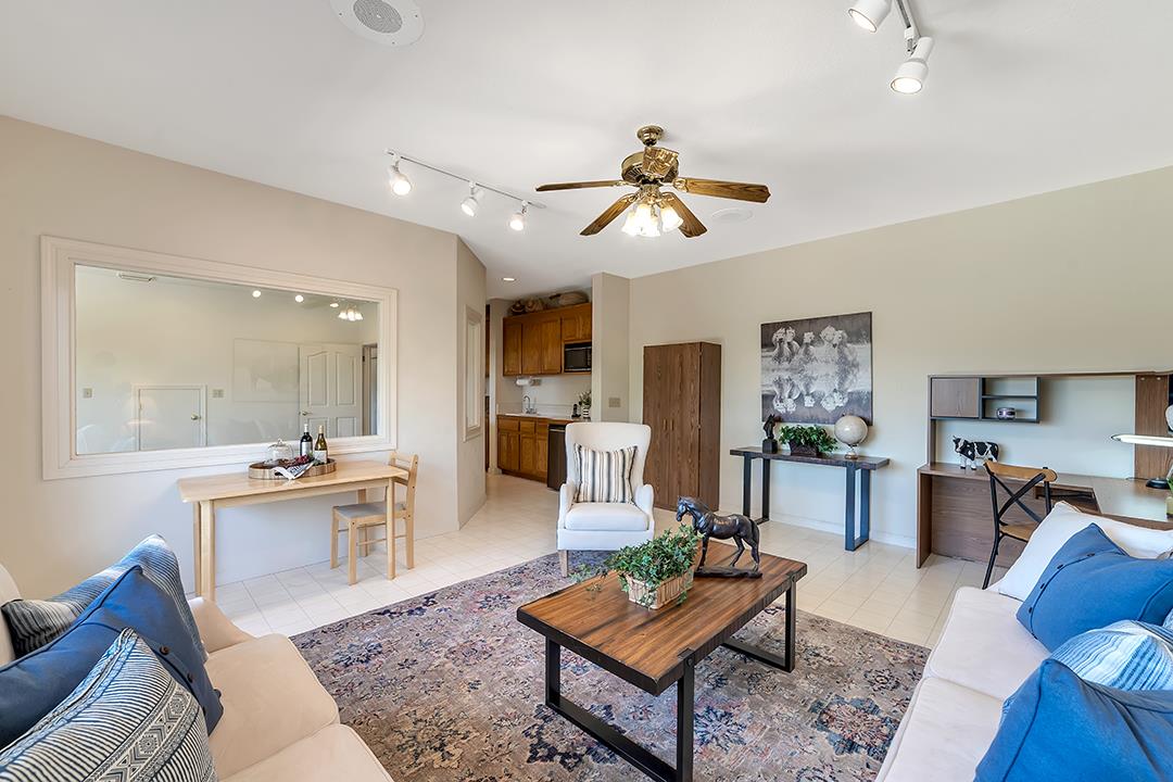 3130 Springview Lane San Jose, CA 95140 - Photo 21 of 47 a living room with furniture and view of kitchen