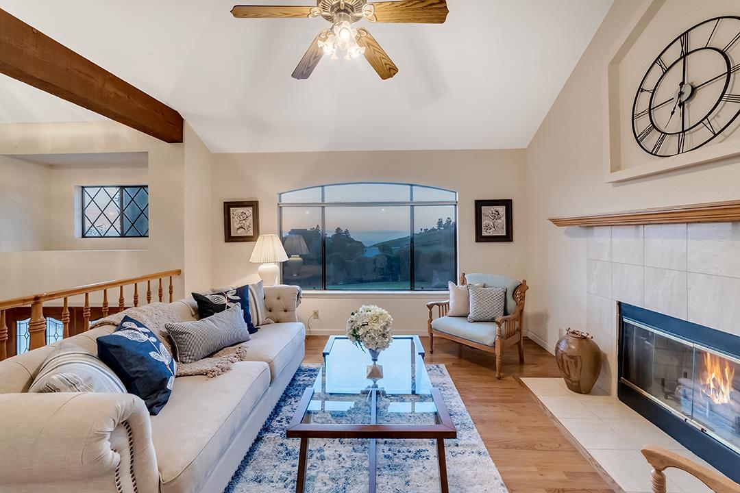 3130 Springview Lane San Jose, CA 95140 - Photo 22 of 47 a living room with furniture and a fireplace