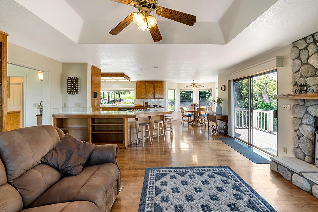 3130 Springview Lane San Jose, CA 95140 - Photo 6 of 47 a living room with furniture and a large window
