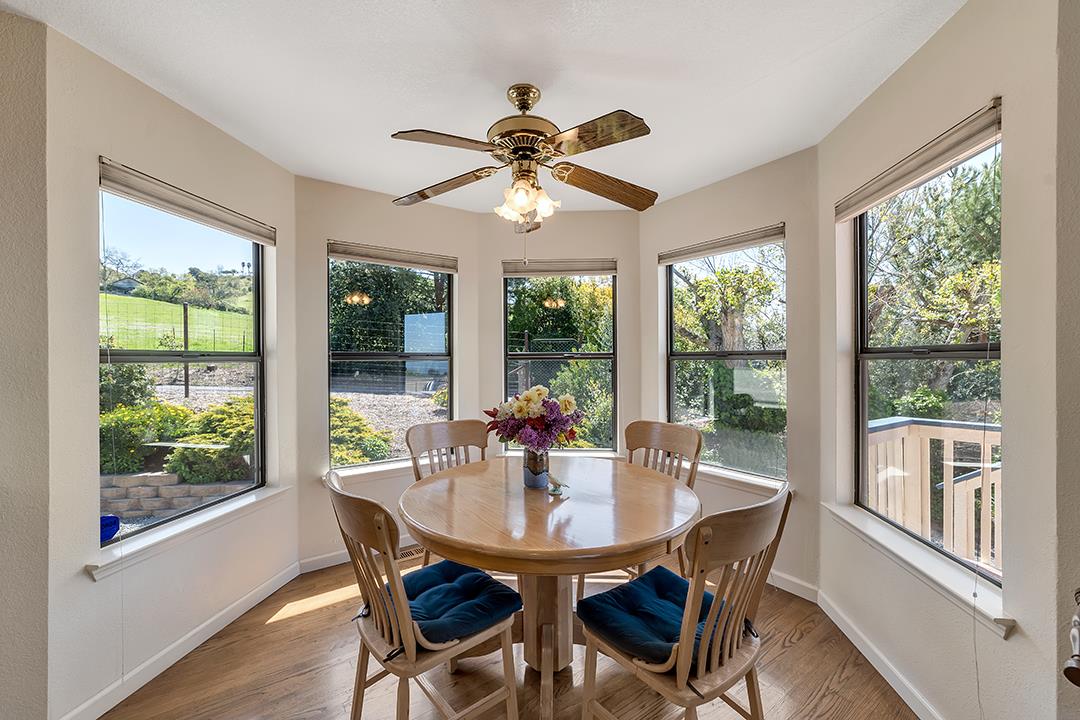 3130 Springview Lane San Jose, CA 95140 - Photo 10 of 47 a dining room with furniture window wooden floor