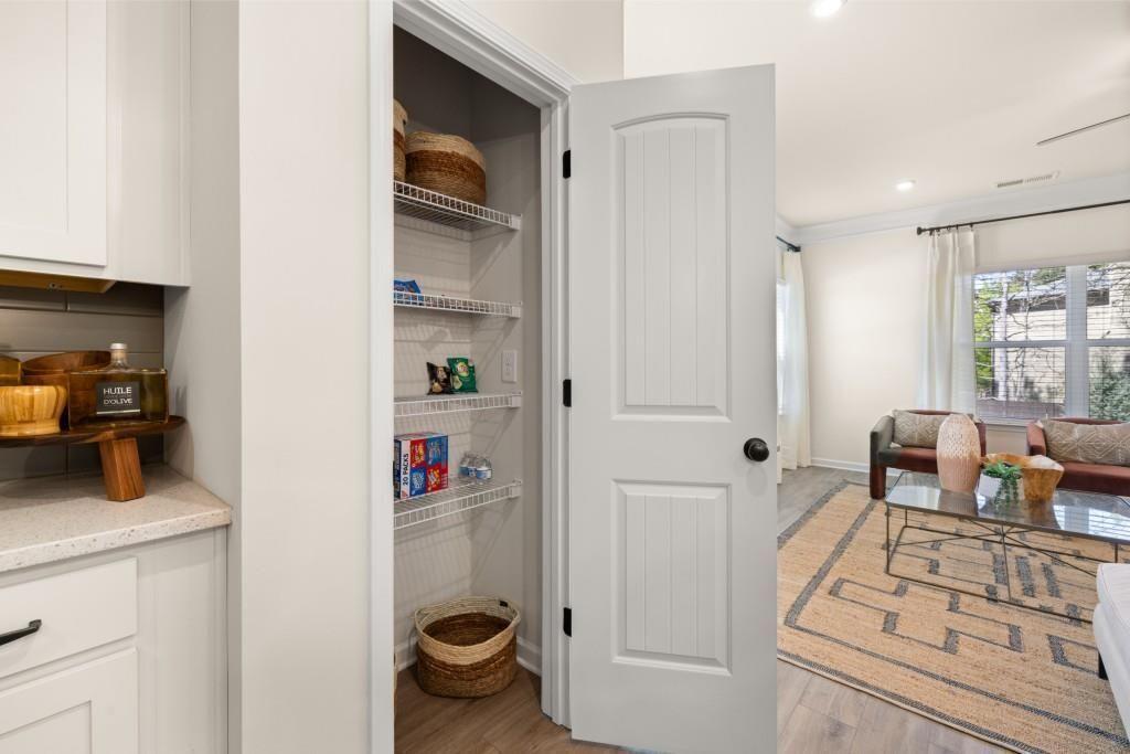 120 Andros Drive, Unit 22A Dalton, GA 30721 - Photo 11 of 43 a kitchen with a refrigerator and cabinets