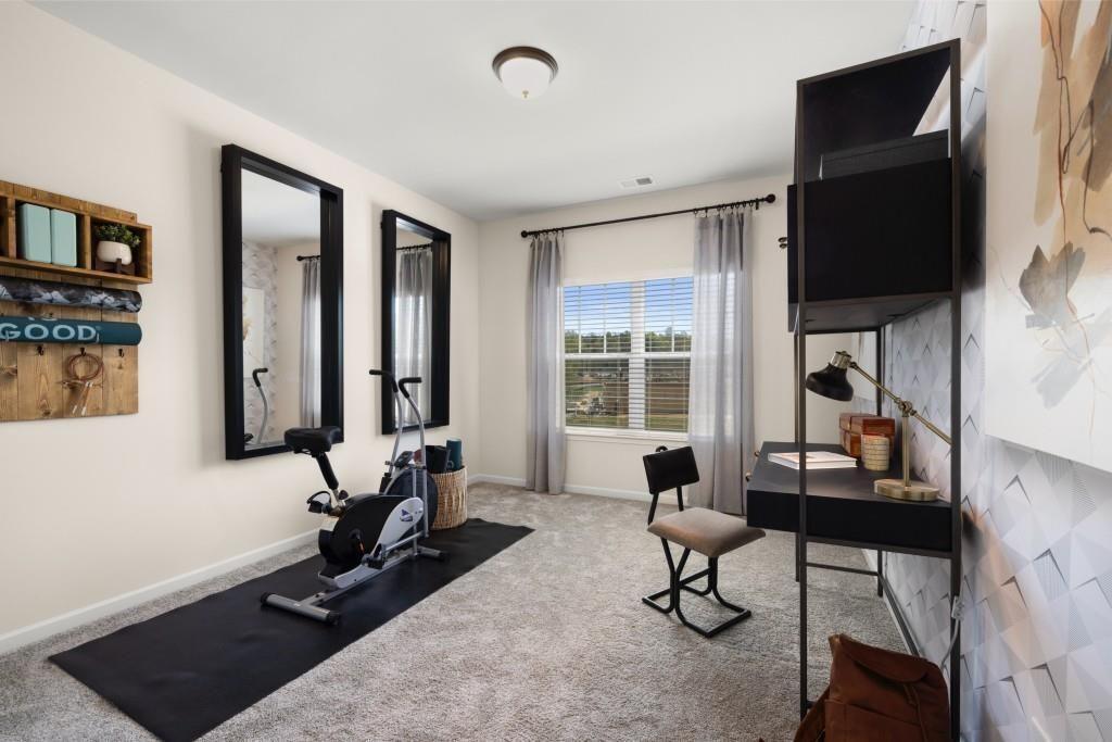 120 Andros Drive, Unit 22A Dalton, GA 30721 - Photo 40 of 43 a view of a livingroom with workspace and a couch