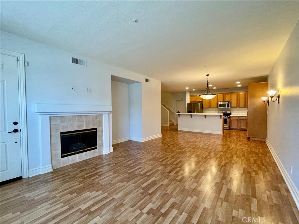 26 Cabazon Irvine, CA 92602 - Photo 4 of 9 a view of a livingroom with a fireplace