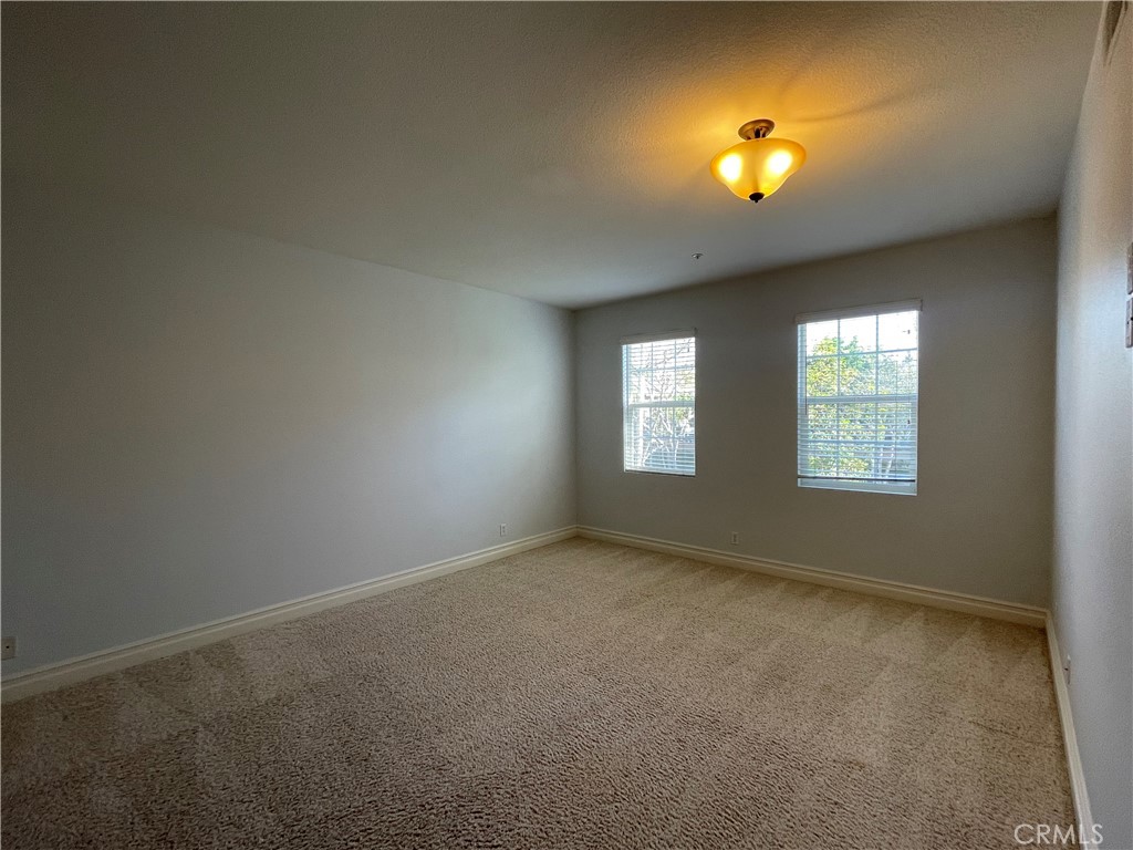 26 Cabazon Irvine, CA 92602 - Photo 6 of 9 a view of an empty room with a window