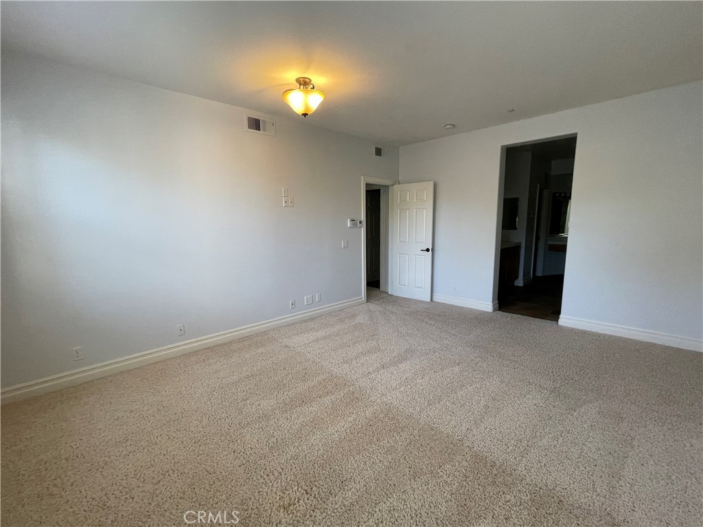 26 Cabazon Irvine, CA 92602 - Photo 7 of 9 a view of an empty room with a window