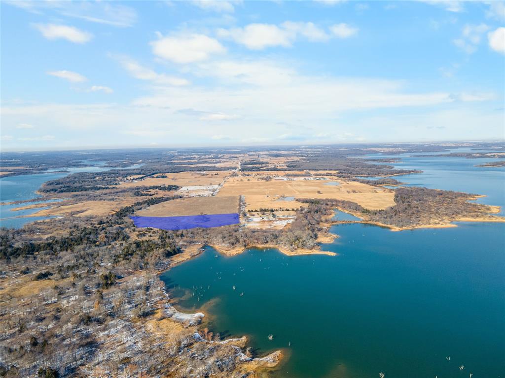 2465 Harpole Road Tioga, TX 76271 - Photo 12 of 14 a view of an ocean and beach