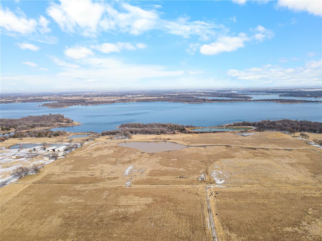2465 Harpole Road Tioga, TX 76271 - Photo 4 of 14 a view of an ocean and beach