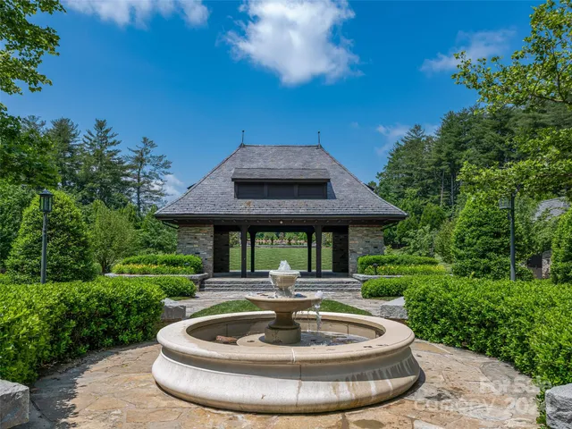 a view of a house with a swimming pool