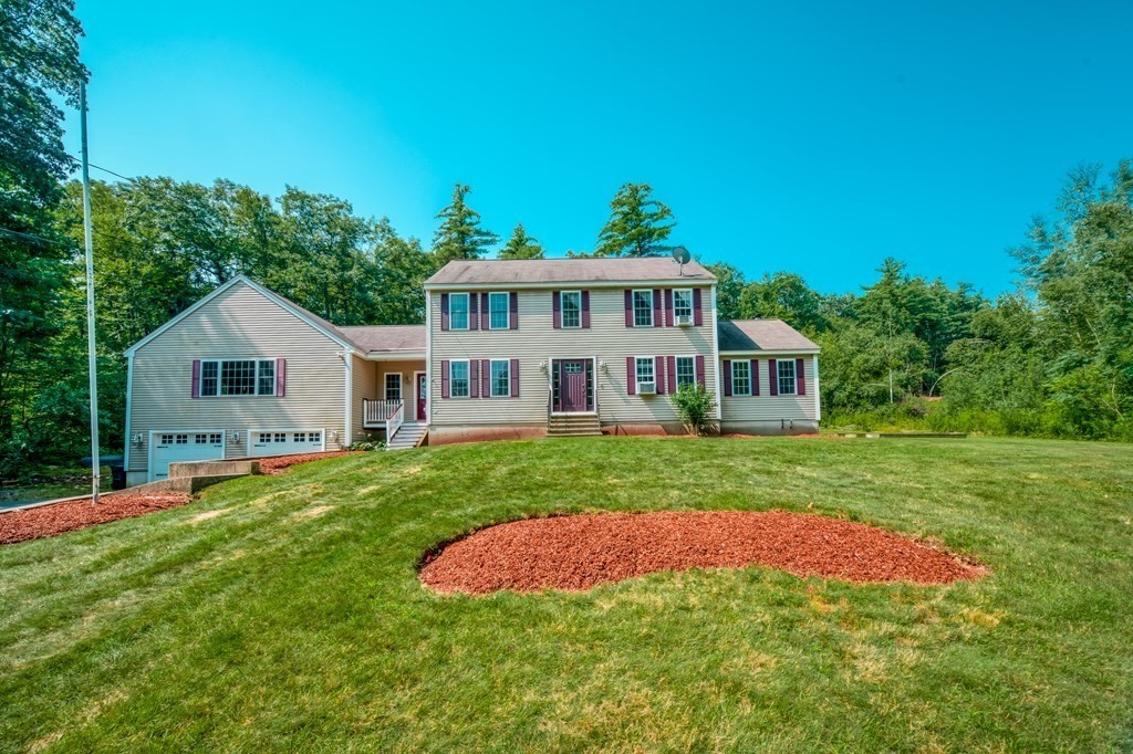 365 Turnpike Road Ashby, MA 01431 - Photo 1 of 37 a view of a house with a yard