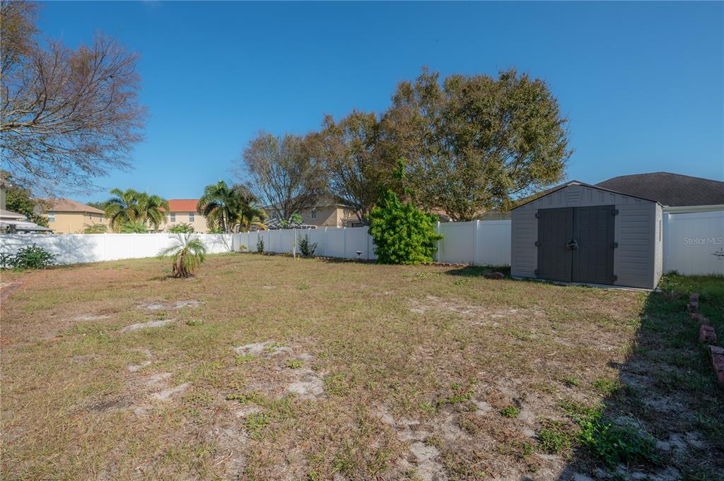 2012 Fern Ridge Court Holiday, FL 34691 - Photo 40 of 54 a house view with a outdoor space