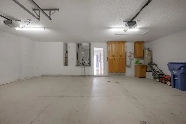 a palm tree sitting in front of a building