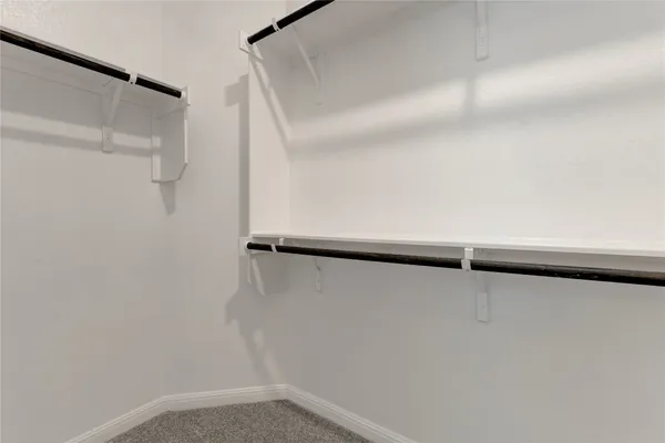 a view of small space with racks on the wall