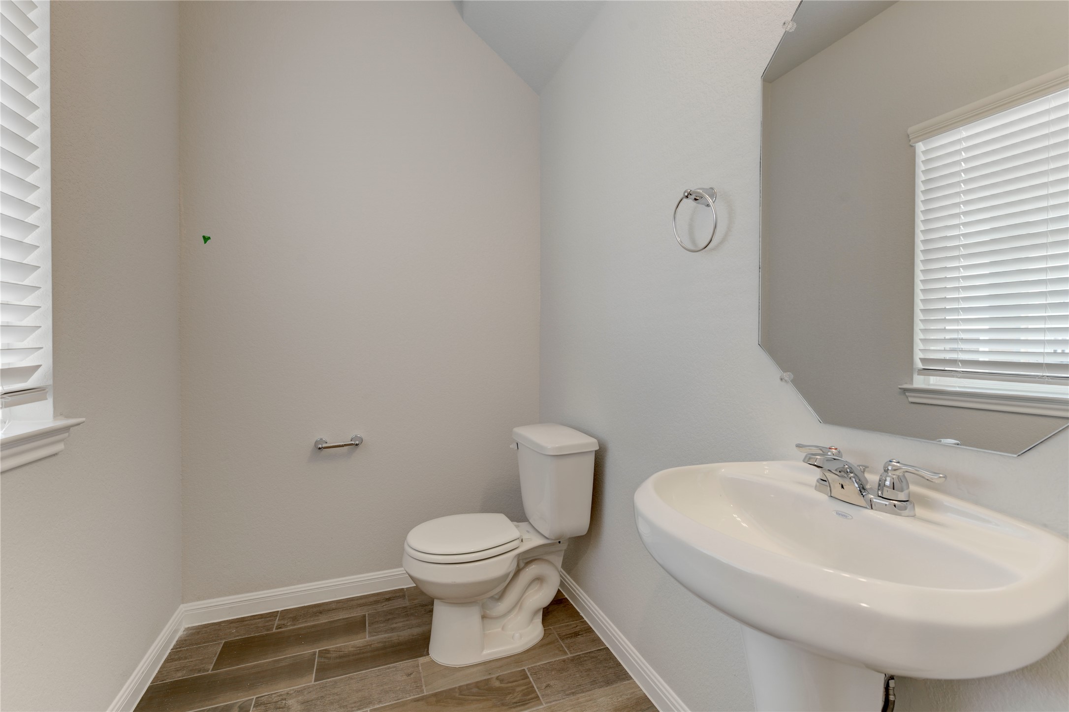 10716 Timber Brook Pass Austin, TX 78747 - Photo 16 of 33 a bathroom with a sink toilet and a mirror