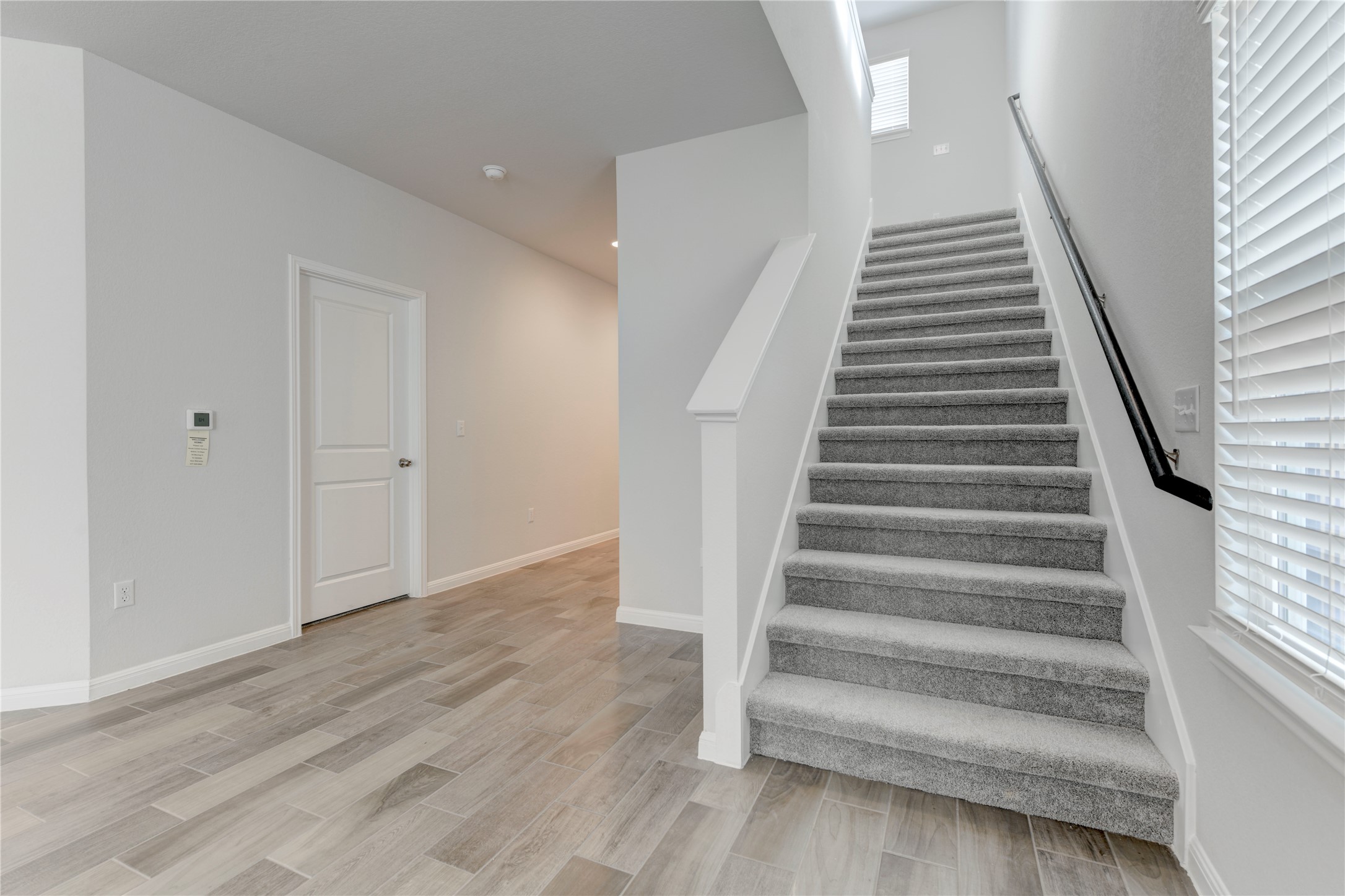 10716 Timber Brook Pass Austin, TX 78747 - Photo 18 of 33 a view of an entryway with wooden floor