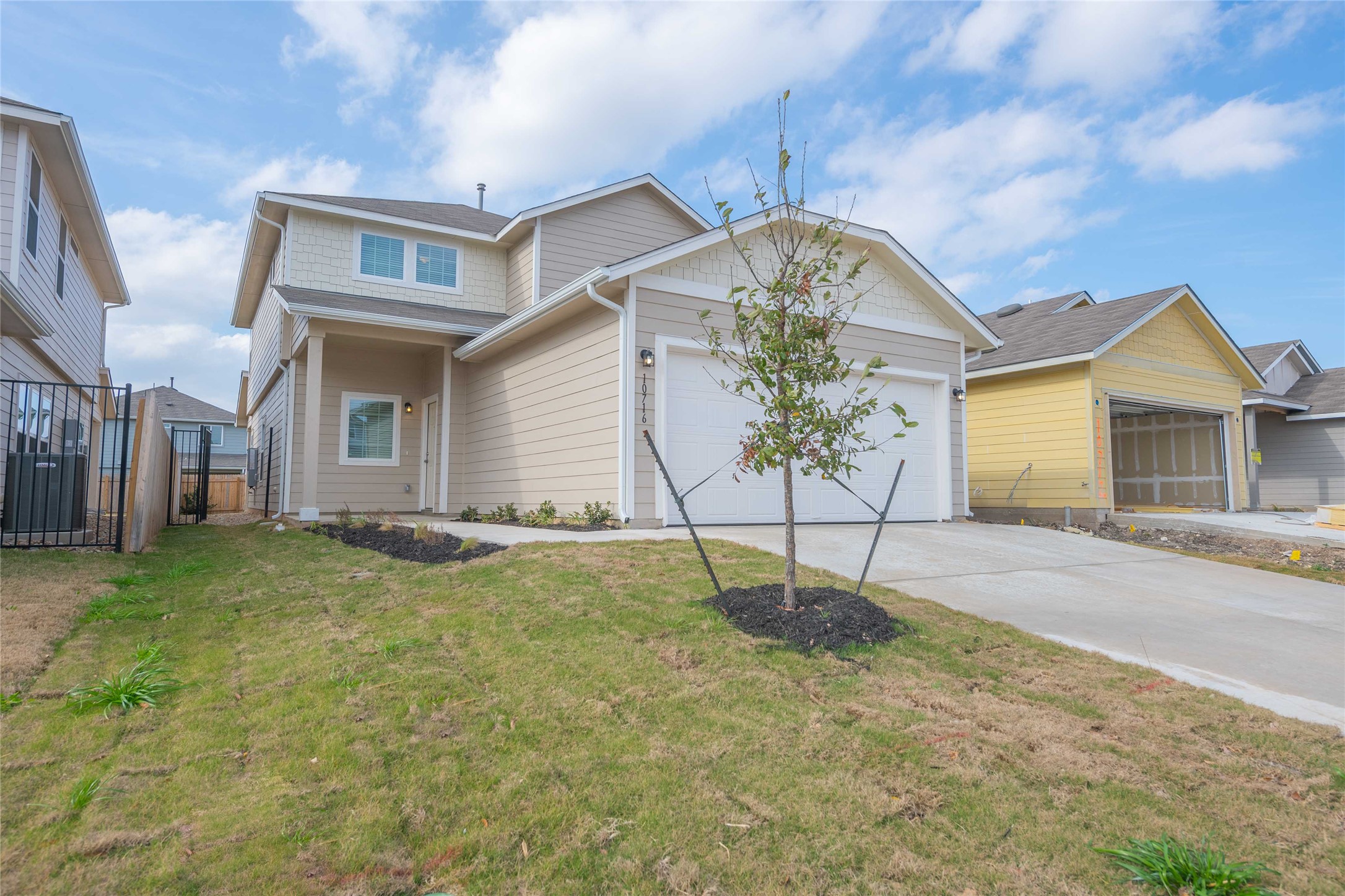 10716 Timber Brook Pass Austin, TX 78747 - Photo 2 of 33 a house view with a backyard space