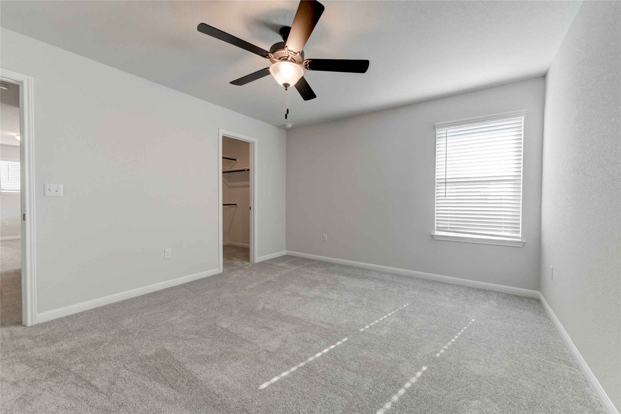 10716 Timber Brook Pass Austin, TX 78747 - Photo 28 of 33 a view of an empty room with a window