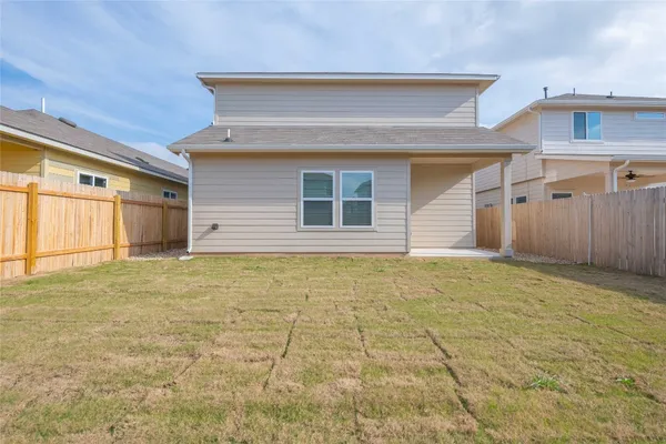 a view of a backyard of garage