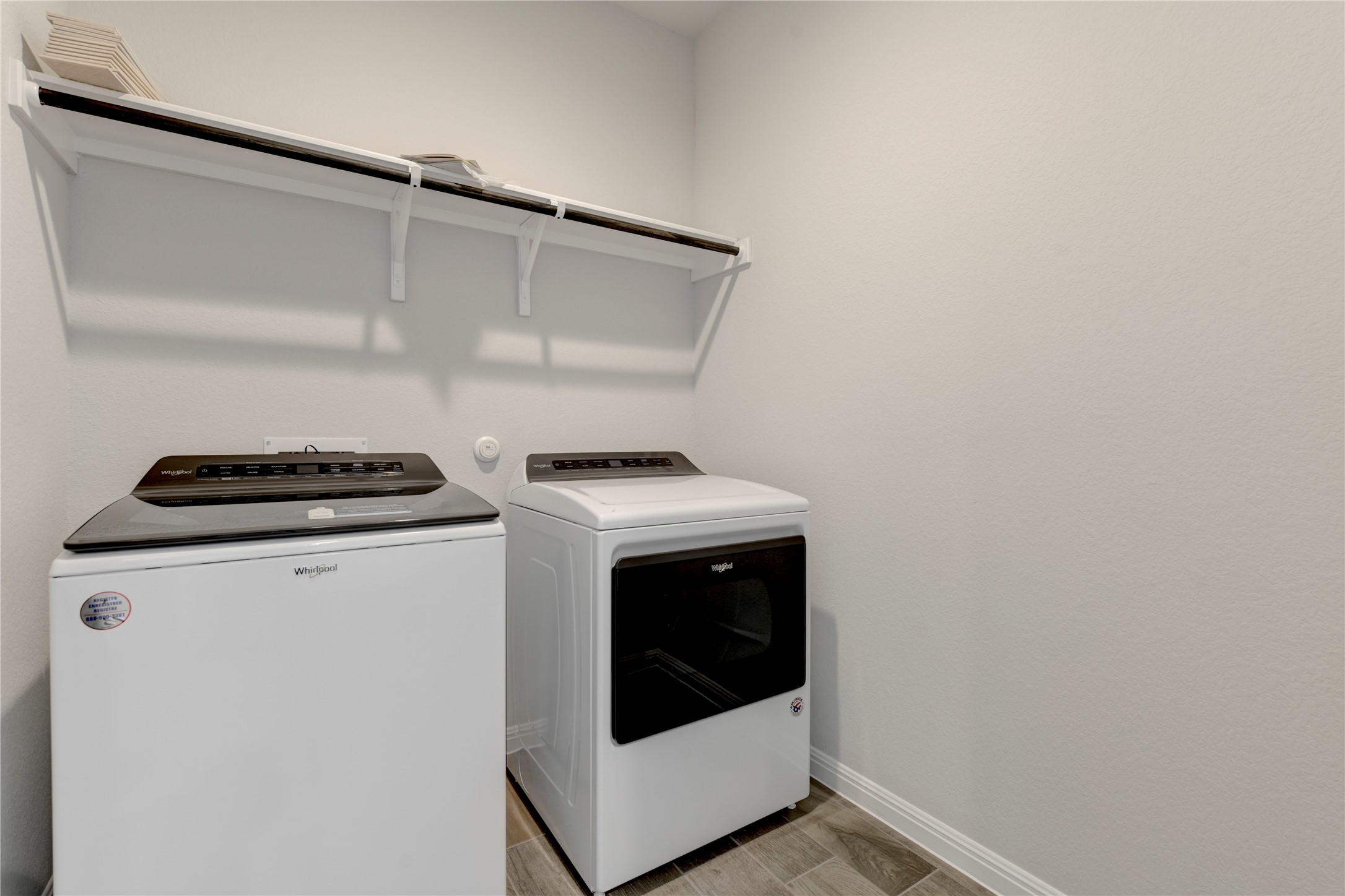 10716 Timber Brook Pass Austin, TX 78747 - Photo 10 of 33 a utility room with dryer and washer