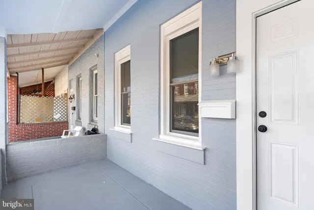 wooden floor and window in a bathroom