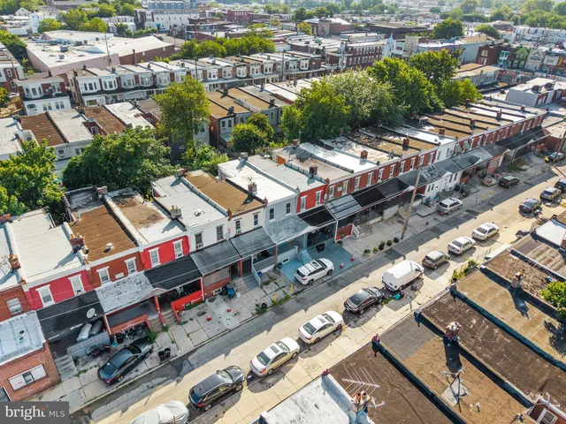 an aerial view of a city with lots of residential buildings