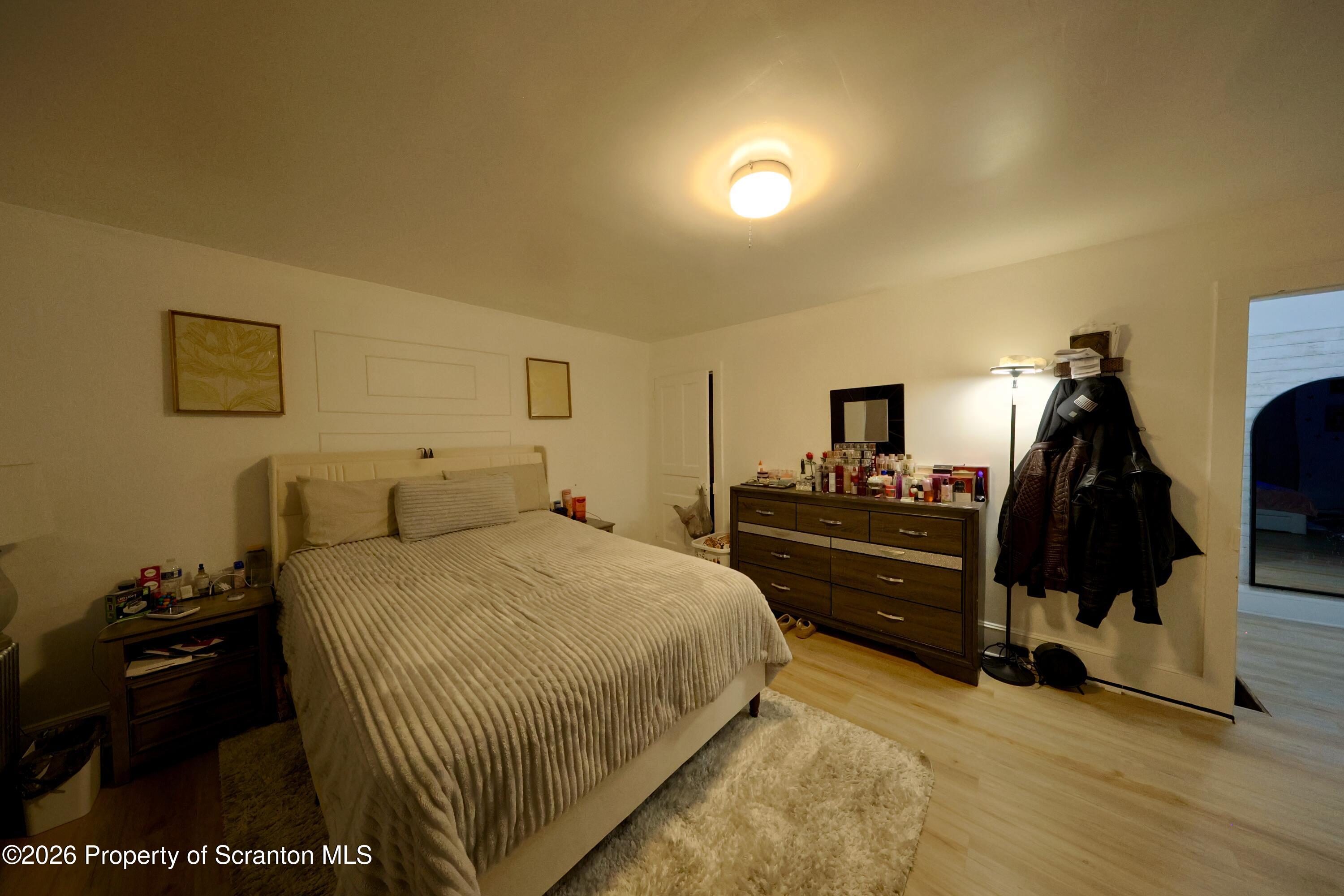 827 Main Street Sugar Notch, PA 18706 - Photo 18 of 25 a bedroom with a bed and a dressers