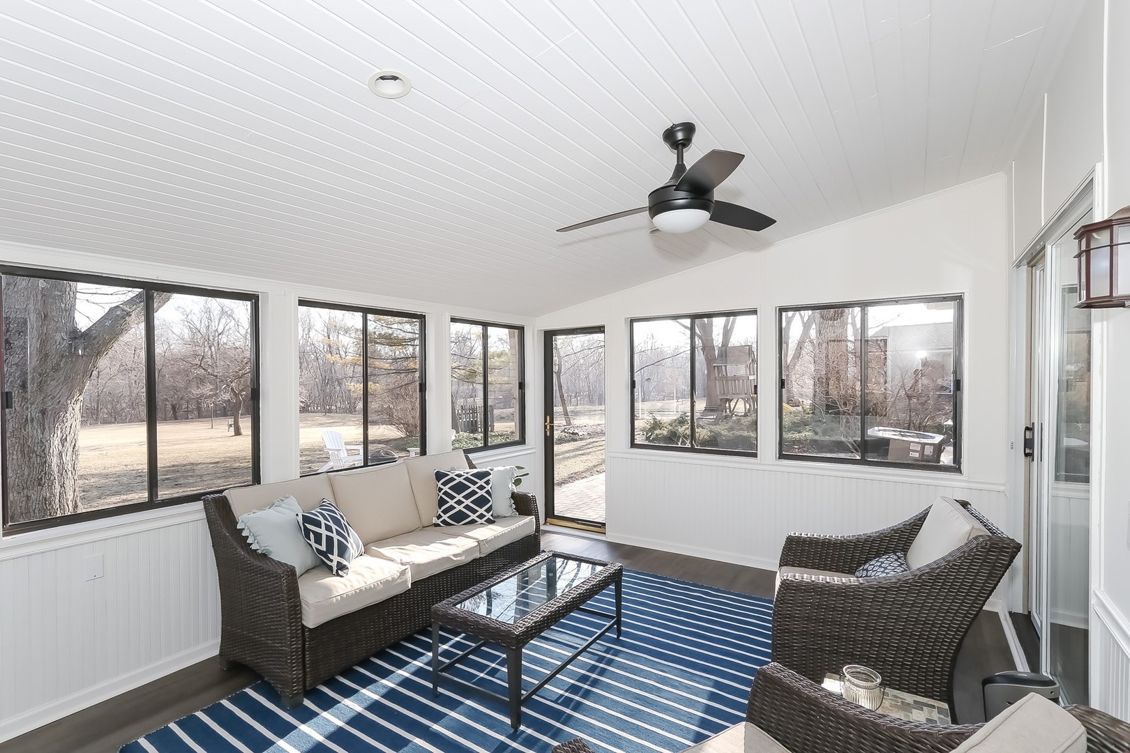879 Georgetowne Lane Barrington, IL 60010 - Photo 18 of 44 a living room with furniture and a large window