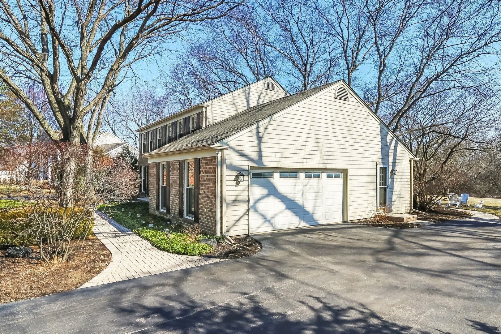 879 Georgetowne Lane Barrington, IL 60010 - Photo 22 of 44 a view of a house with a yard and pathway