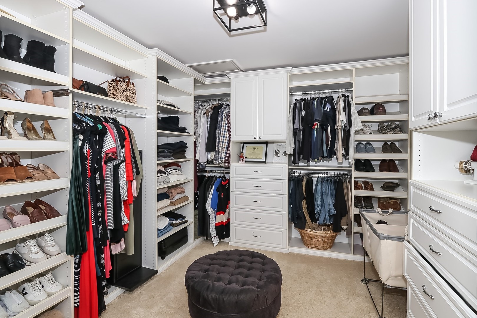 879 Georgetowne Lane Barrington, IL 60010 - Photo 27 of 44 a view of walk in closet with clothes and shoes