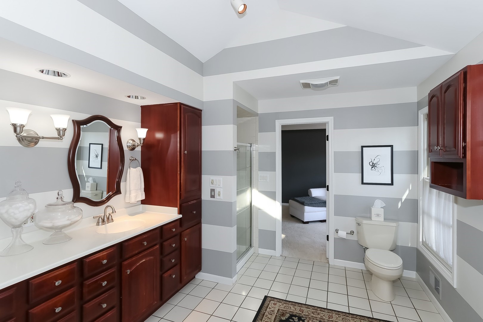 879 Georgetowne Lane Barrington, IL 60010 - Photo 28 of 44 a spacious bathroom with a double vanity sink mirror and toilet