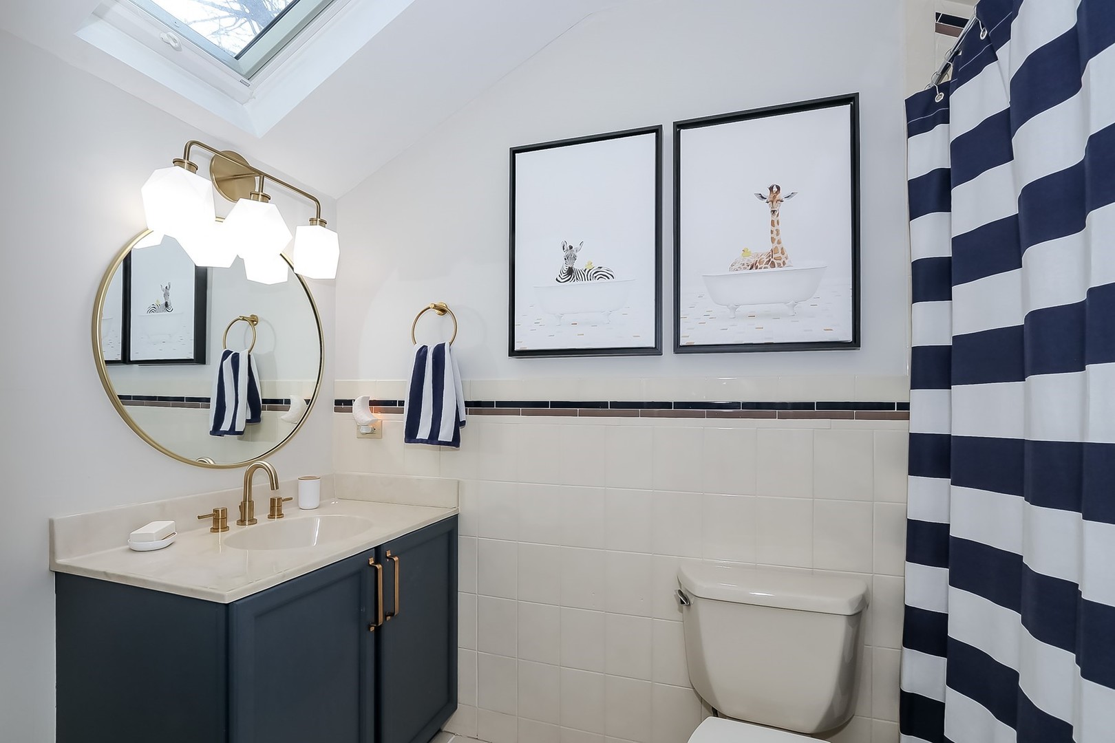 879 Georgetowne Lane Barrington, IL 60010 - Photo 34 of 44 a bathroom with a sink a mirror a toilet and a mirror