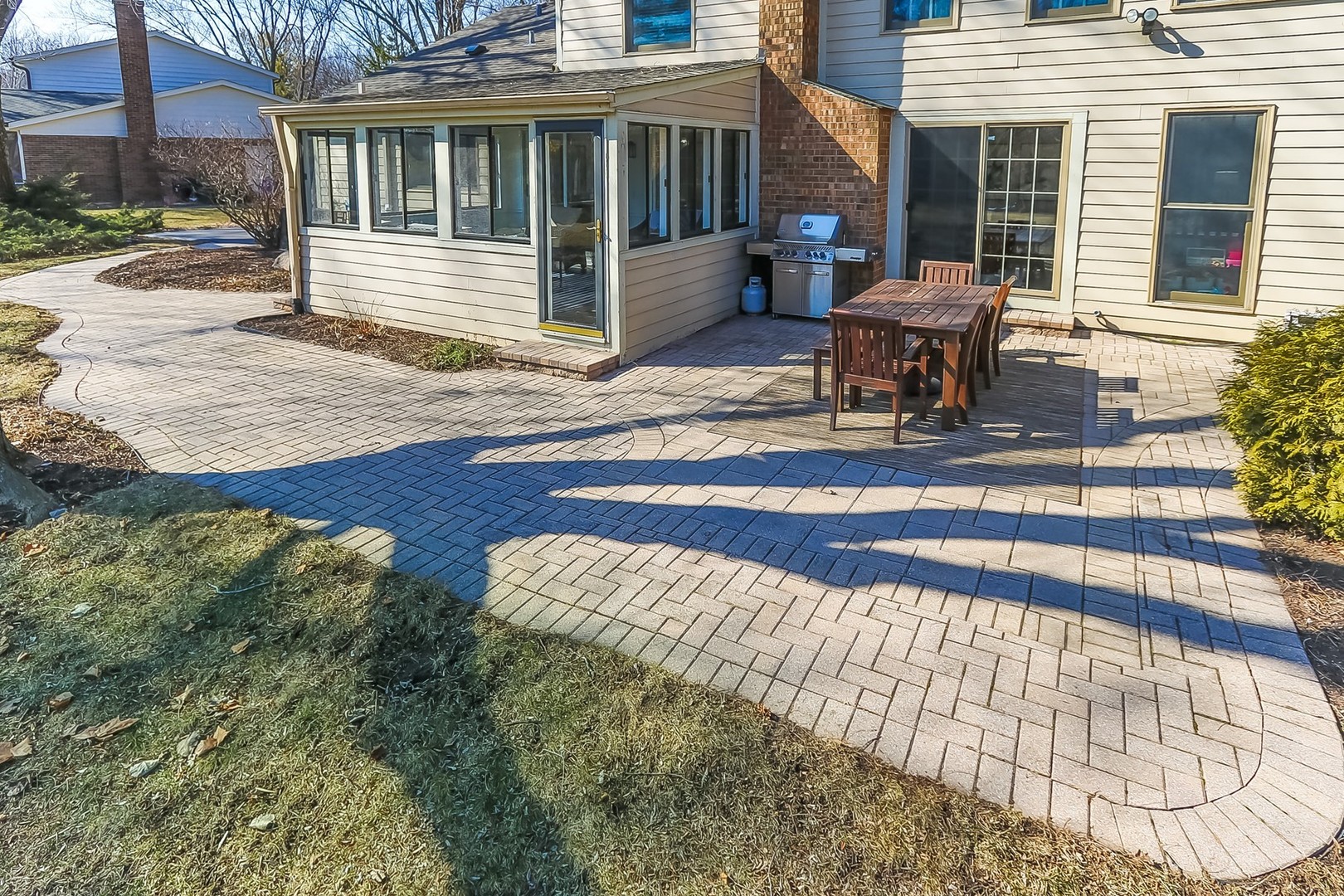 879 Georgetowne Lane Barrington, IL 60010 - Photo 43 of 44 a view of a house with a bench