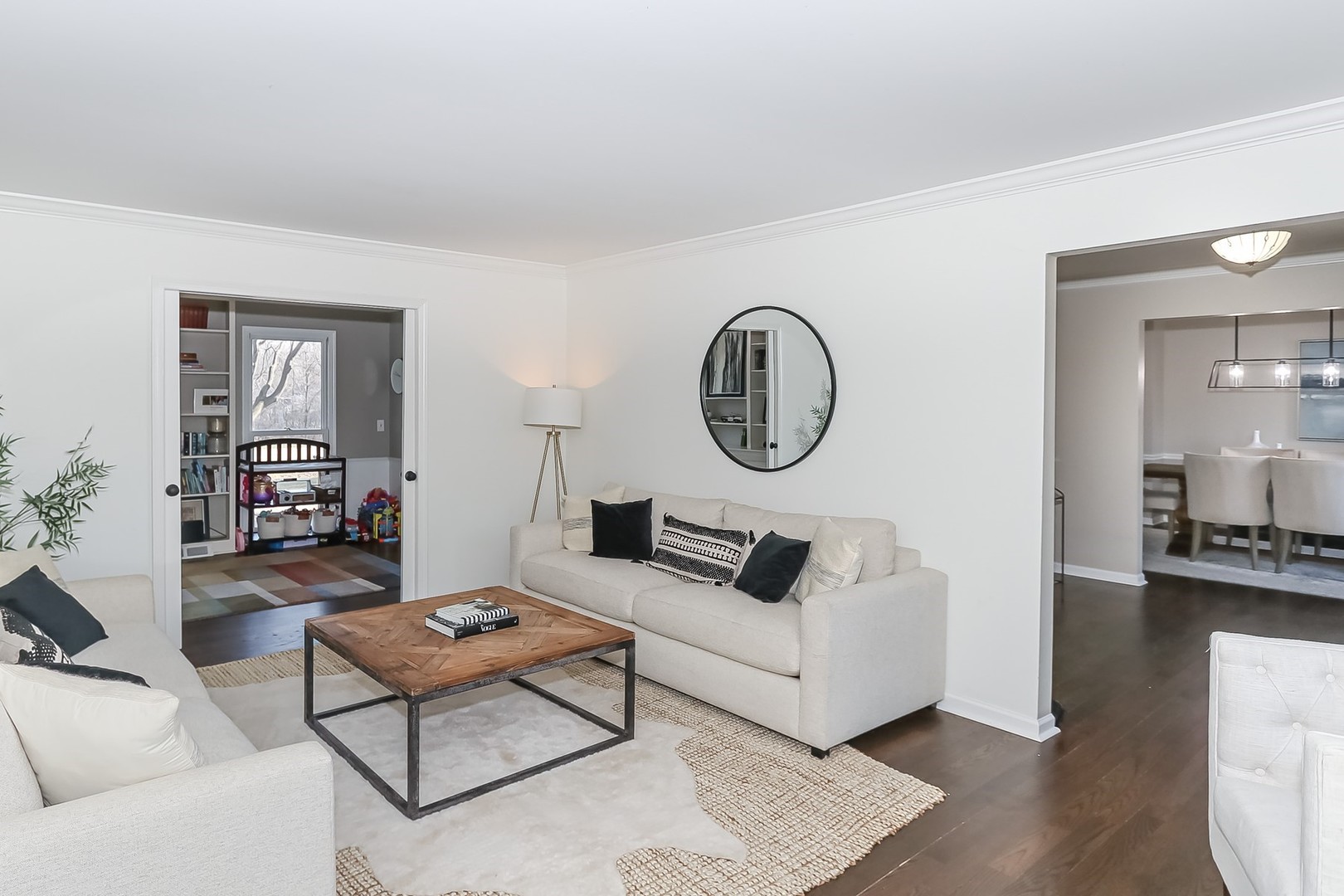 879 Georgetowne Lane Barrington, IL 60010 - Photo 10 of 44 a living room with furniture a rug and a mirror