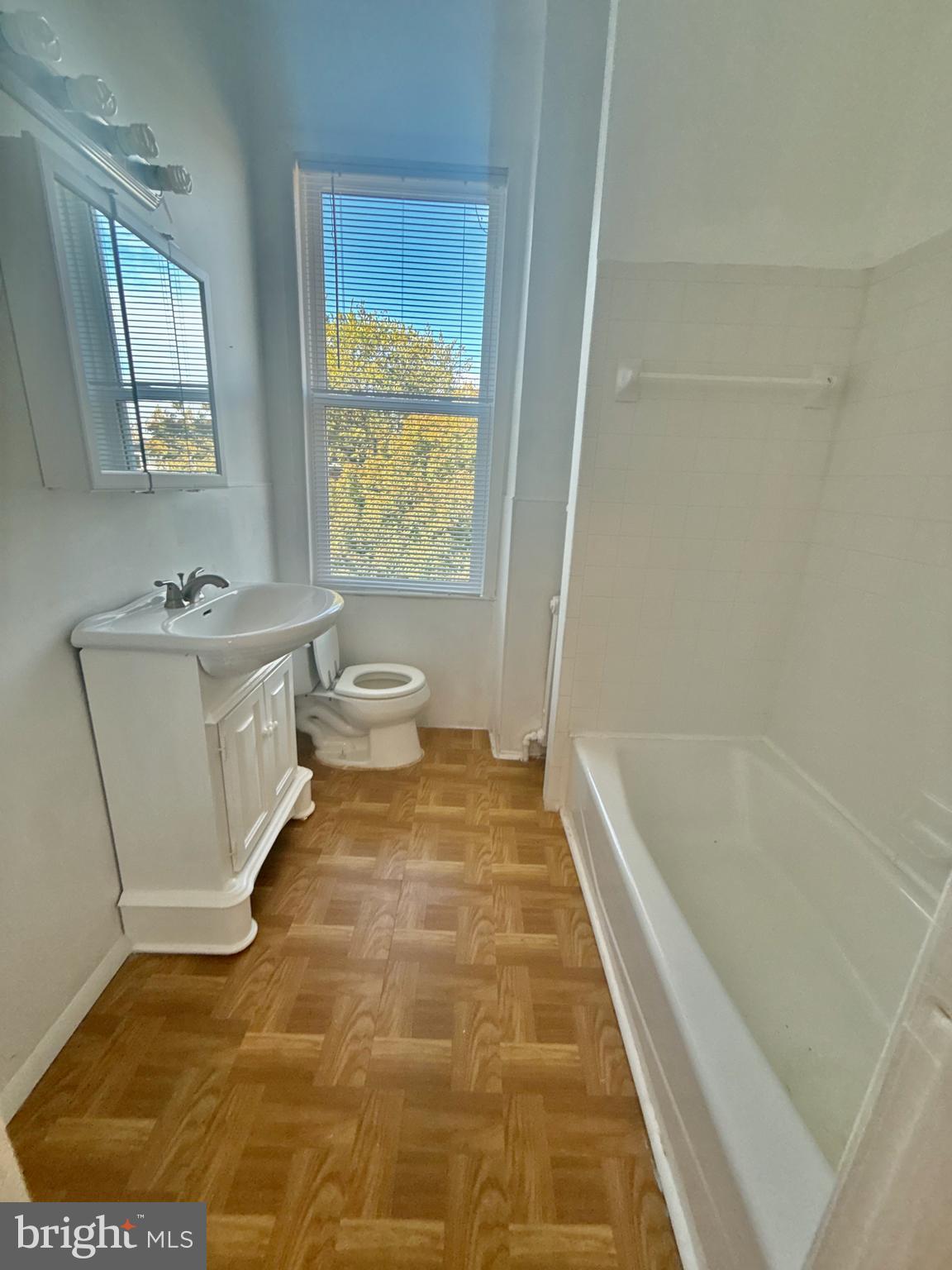 622 11th Street Northeast Washington, DC 20002 - Photo 9 of 15 a bathroom with a bathtub and toilet