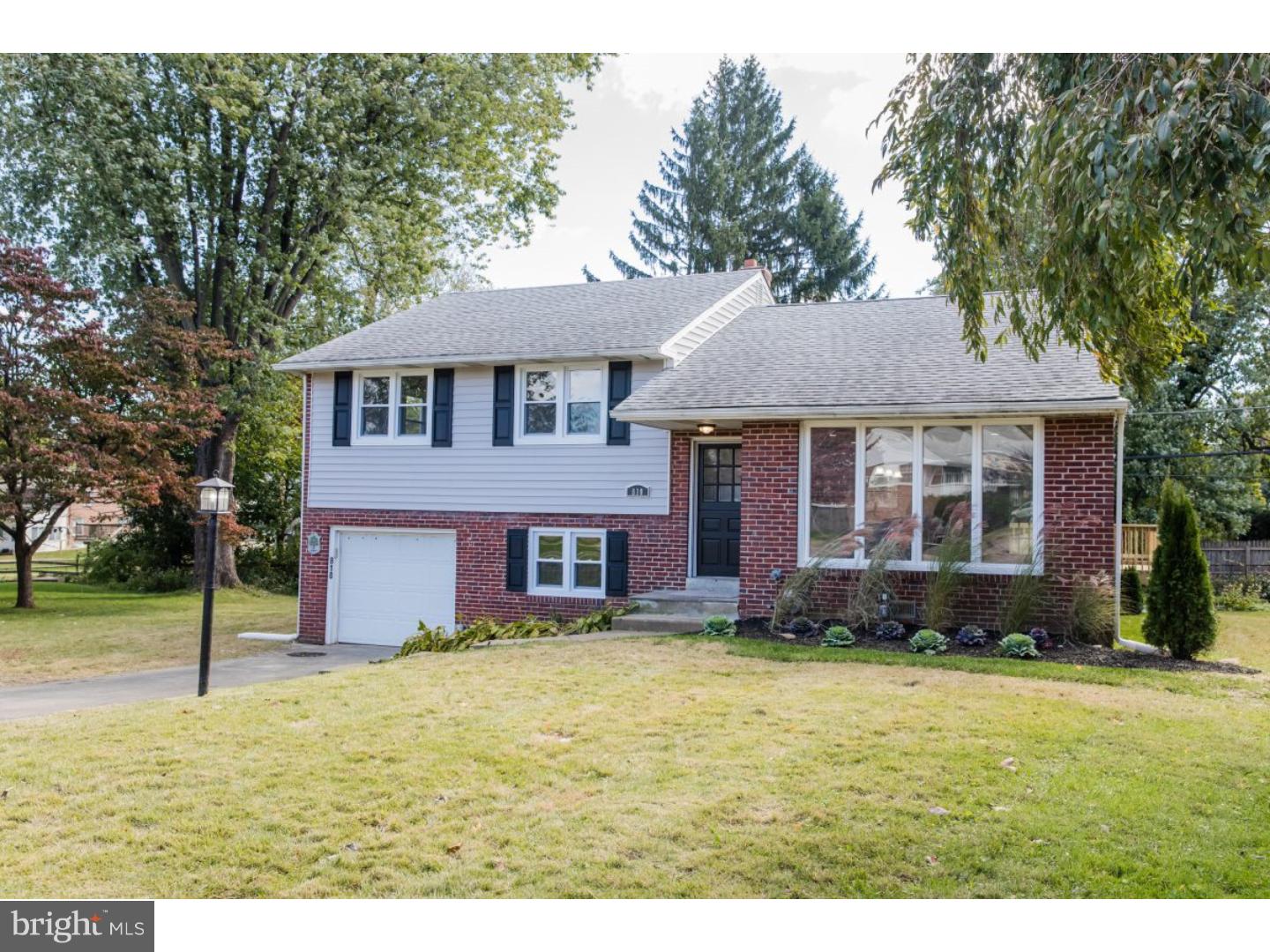 810 Coppock Lane Springfield, PA 19064 - Photo 1 of 24 a front view of a house with a yard
